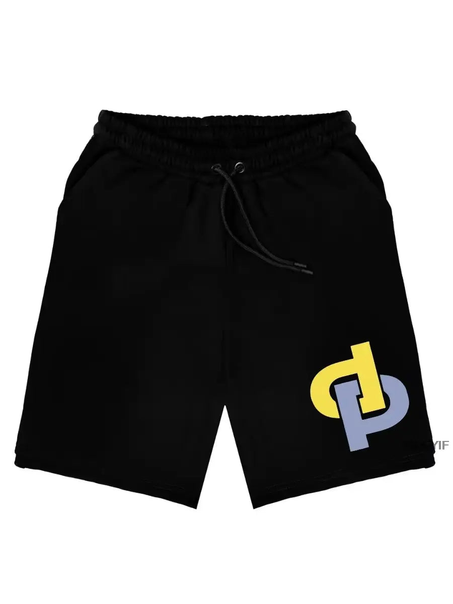 Simples Market black cotton shorts with drawstring, unisex summer beachwear with yellow-blue graphic.