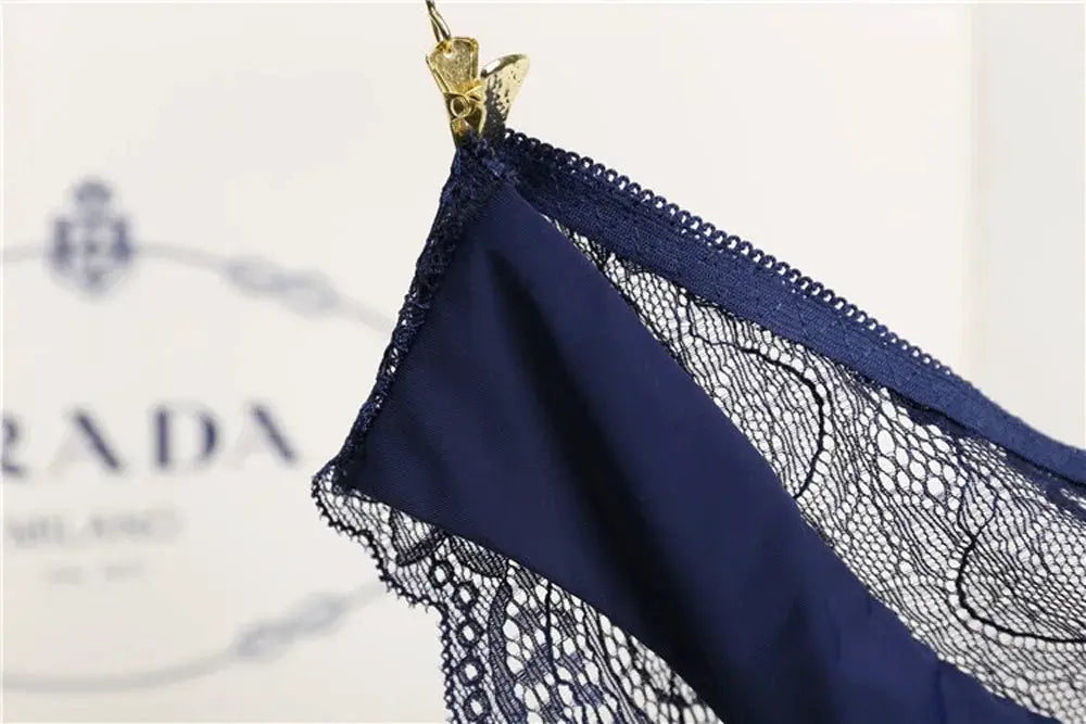 Seamless low-rise navy lace panties for women with scalloped lace trim.
