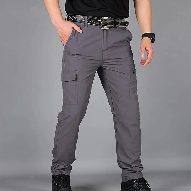 Summer men's quick-dry outdoor pants, grey cargo workwear trousers with multiple pockets.