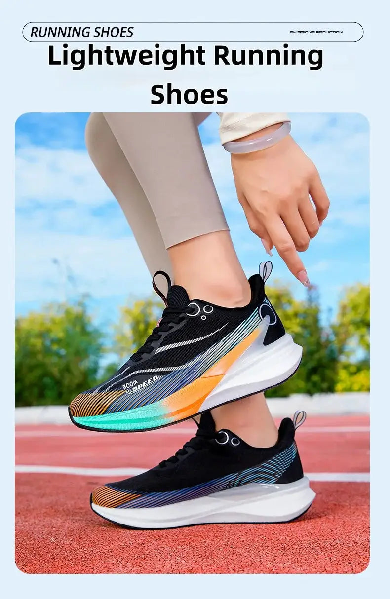 Pair of lightweight running shoes with black upper and multicolor gradient side stripes; white cushioned midsole.