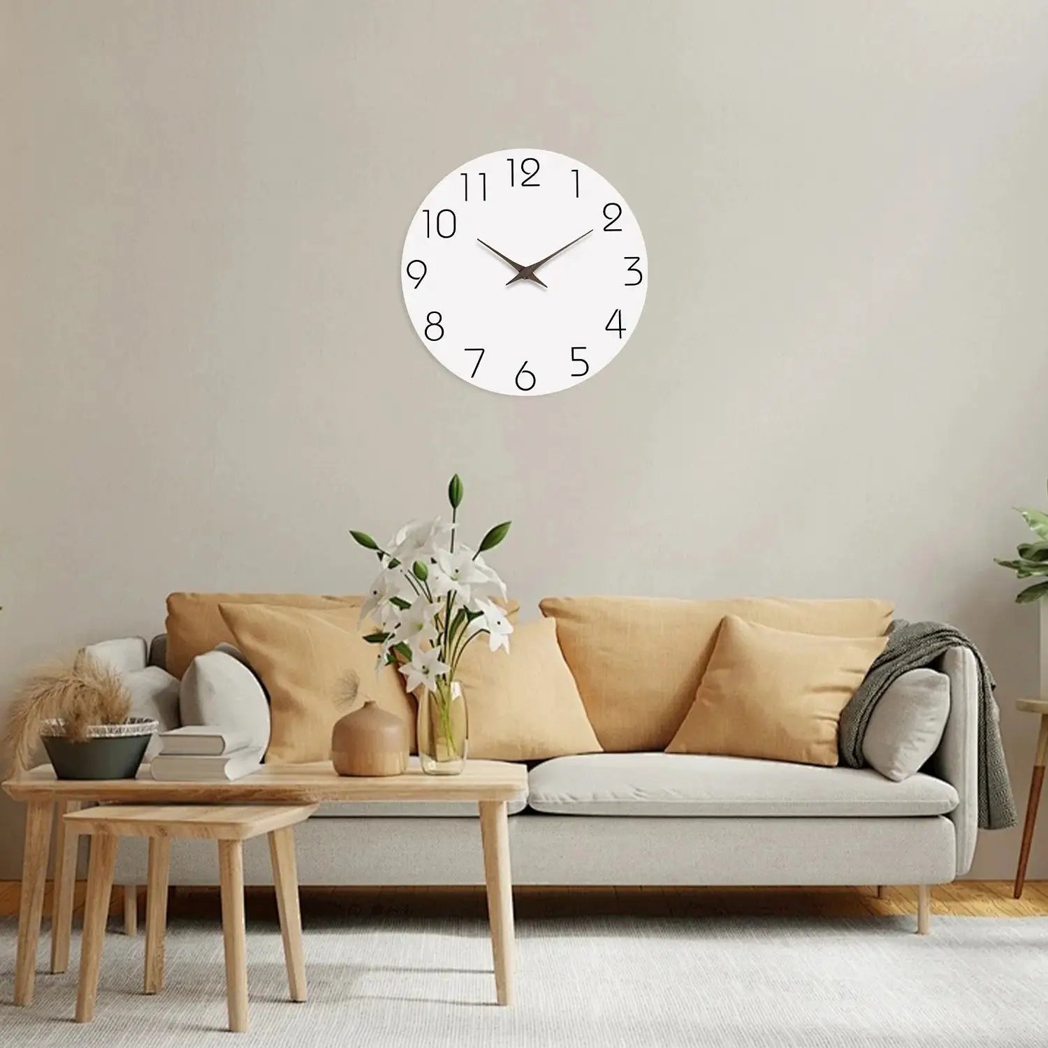 Casual modern white wooden wall clock with black numerals and brown hands, for living room decor