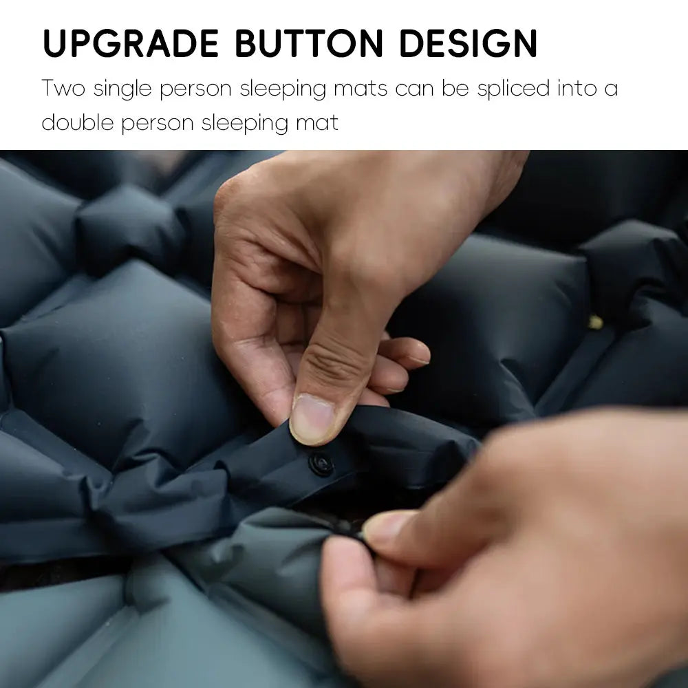 TARKA inflatable camping mat close-up of valve being secured on a dark gray self-inflating air mattress