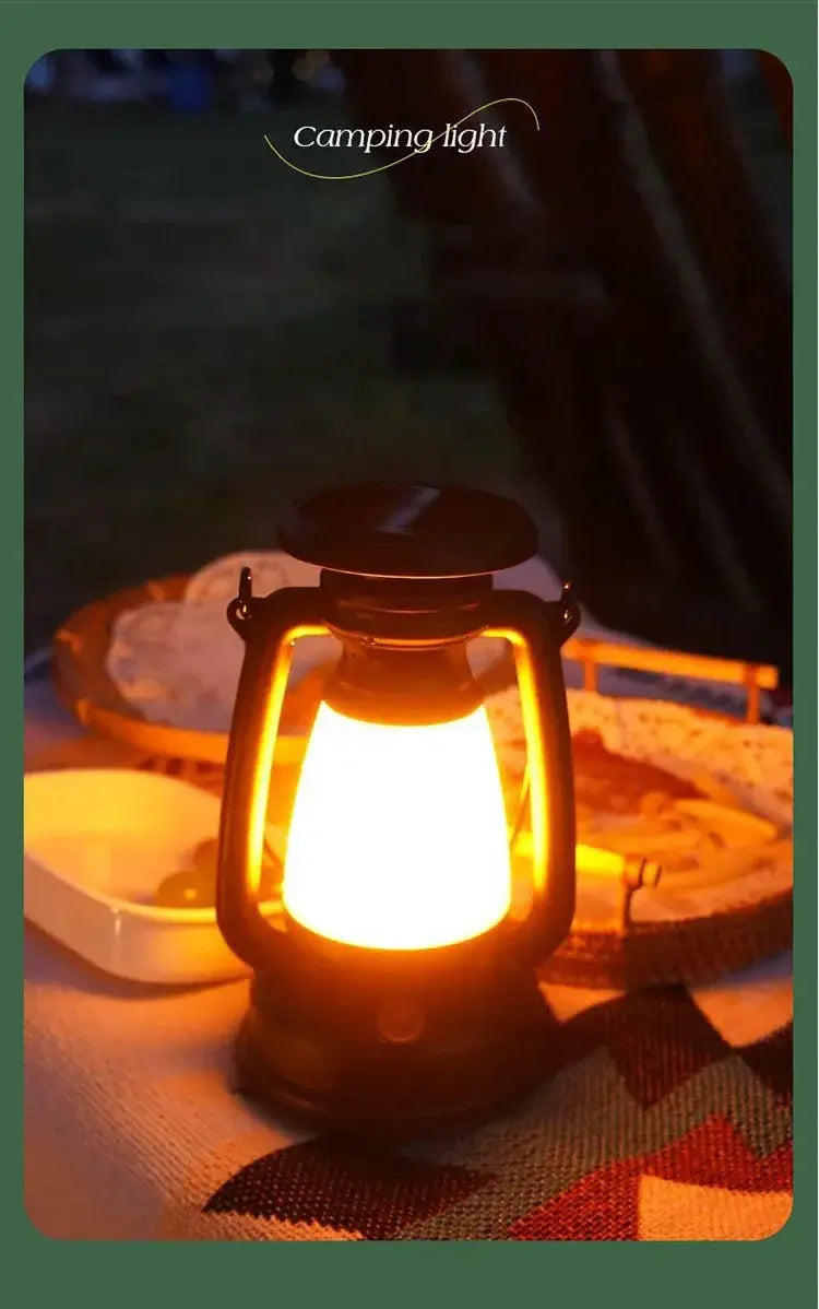 Retro camping lantern LED desk lamp with warm amber glow and charging capability