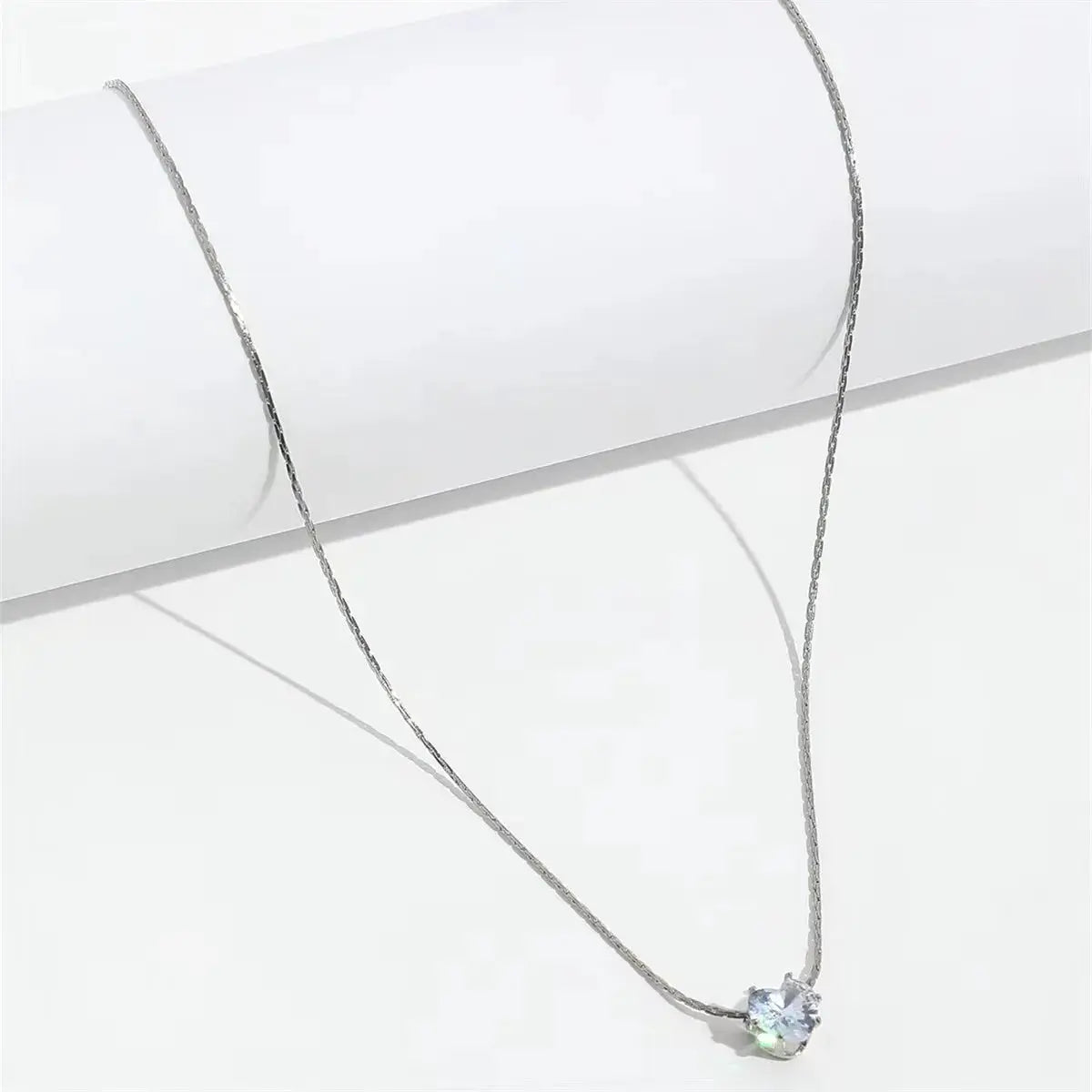 PerisBox dainty minimalist zircon necklace with a round clear CZ stone on an anti-tarnish stainless steel chain