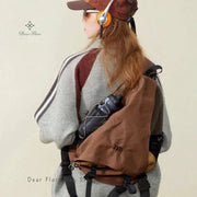 Y2K-inspired portable nylon crossbody bag, brown, unisex travel chest pack for outdoor use