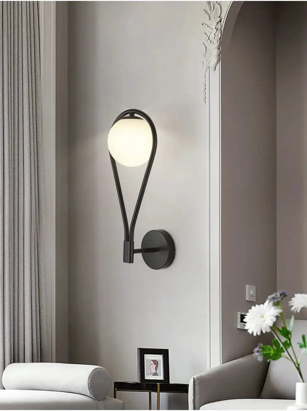 Nordic Creative Luxury Glass Ball LED Wall Lamp, black metal frame with white glass globe for a modern living room
