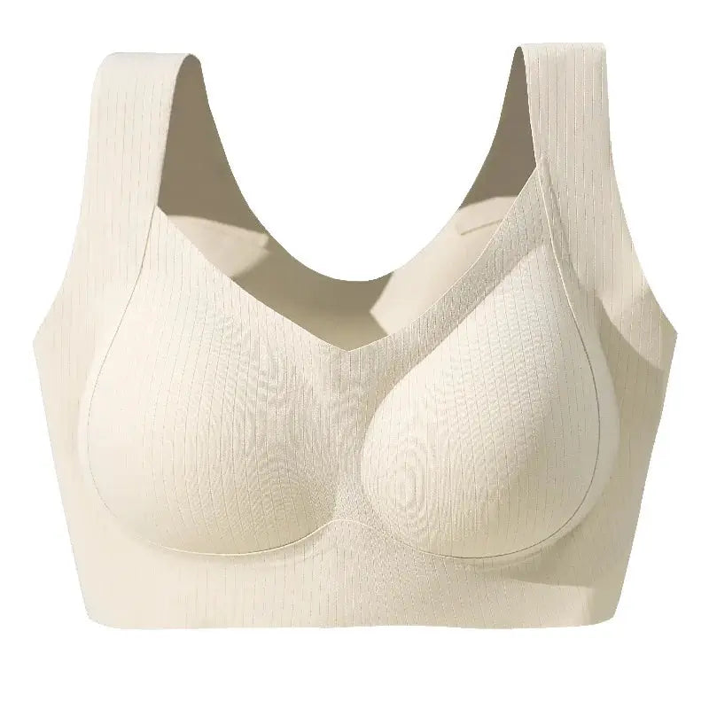 One-piece beige bra with wide straps and seamless cups for sleepwear