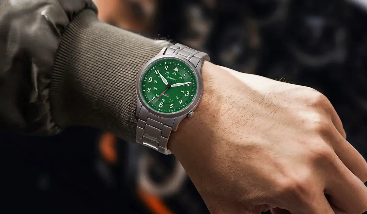BERNY titanium men's field watch with green dial on silver metal bracelet; luminous hands