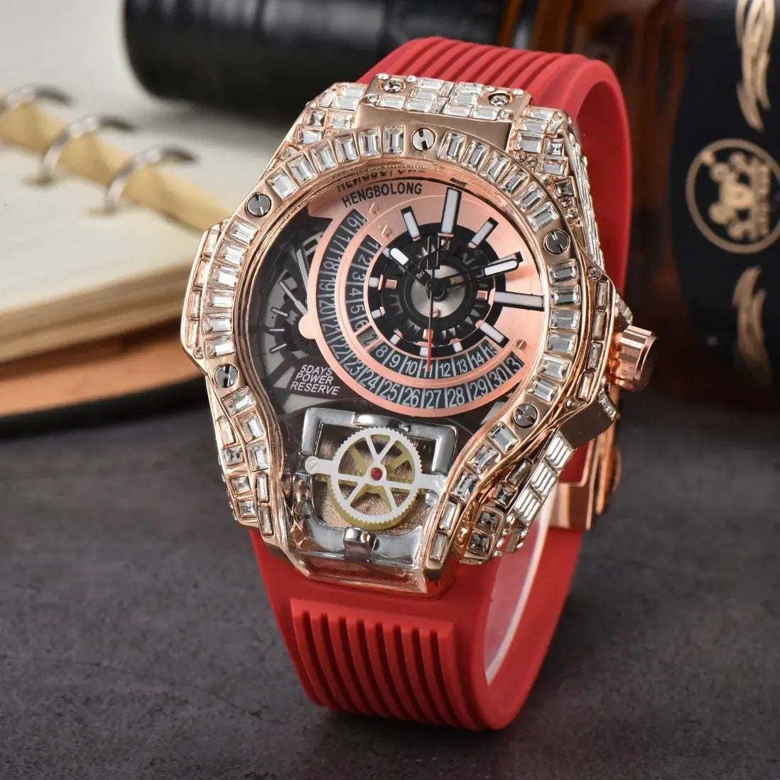 Men's luxury diamond-studded watch with rose-gold bezel and red rubber strap