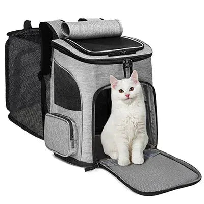 Cat carrier backpack in gray fabric with mesh panels and front entry.