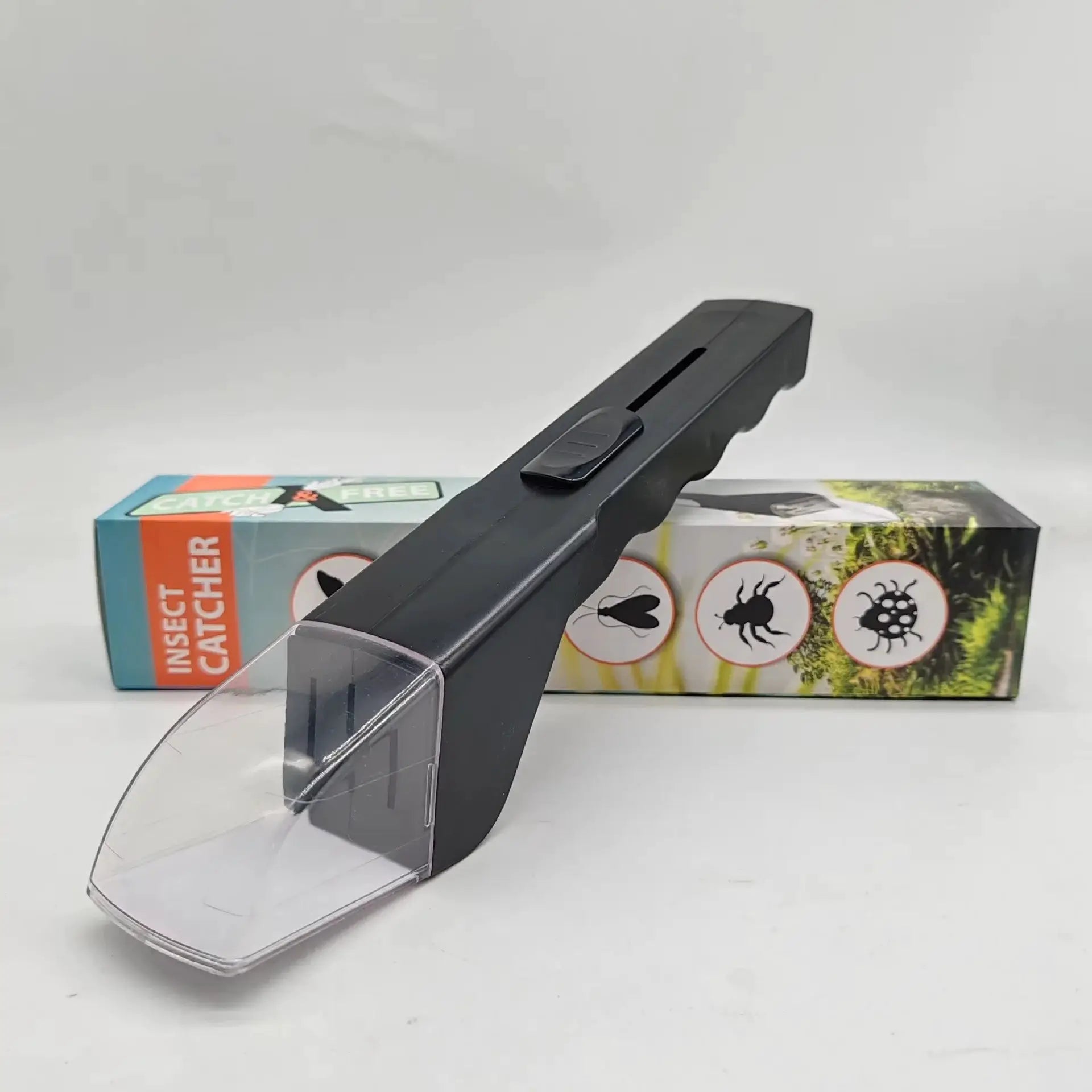 Handheld insect catcher with clear plastic trap and black body