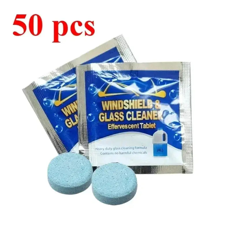 Car windshield glass cleaner effervescent tablets, two blue tablets with blue foil sachets