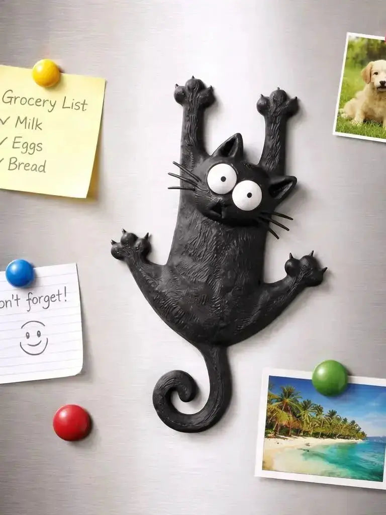 Magnetic cat refrigerator magnet by Simples Market; black cartoon cat with big white eyes and curled tail