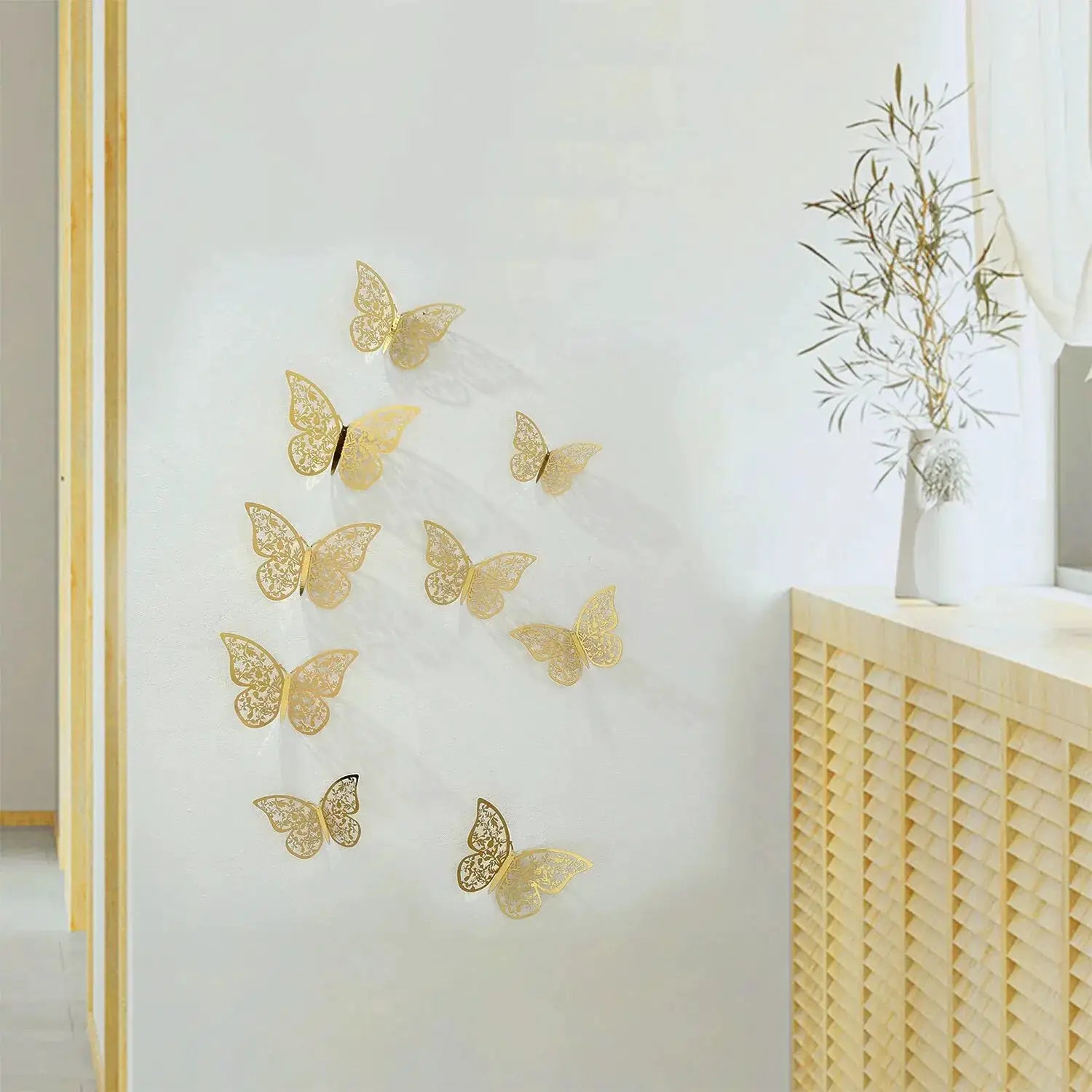 12-piece gold metal-inspired hollow 3D butterfly wall decor by Simples Market
