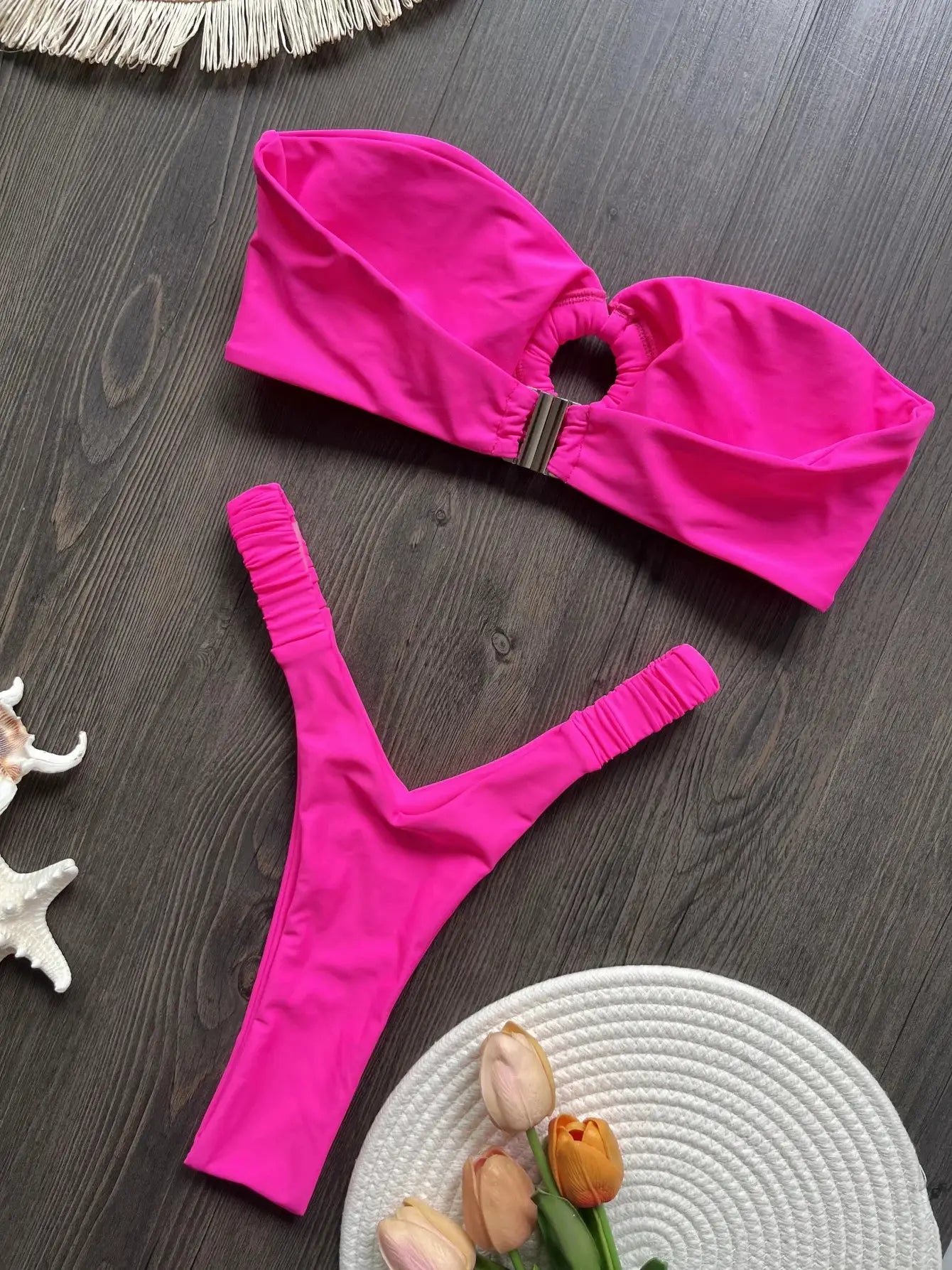 Simples Market pink two-piece micro bikini set with center-ring bandeau top and thong bottoms