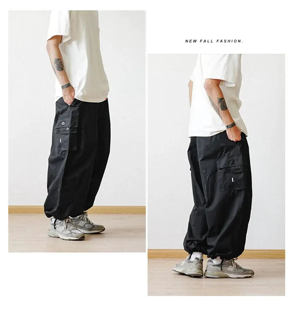 Simples Market men's black oversized cargo pants with multiple pockets and elastic ankle cuffs