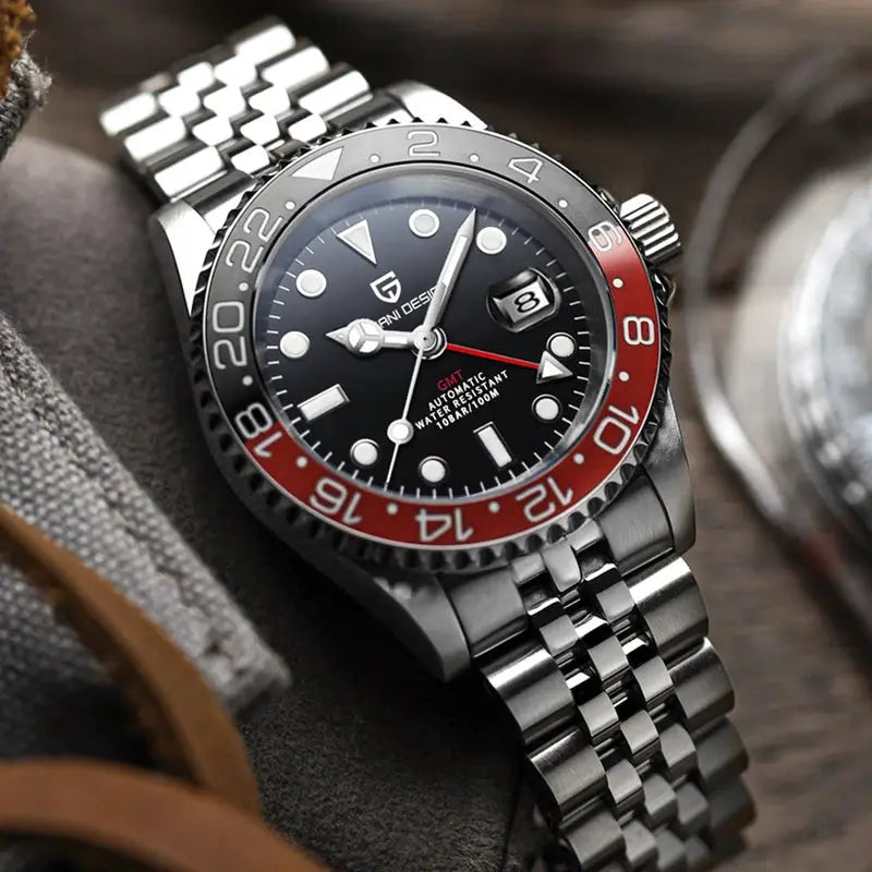 PAGANI DESIGN GMT watch with black dial, red/black bezel, stainless steel bracelet, date window at 3, automatic