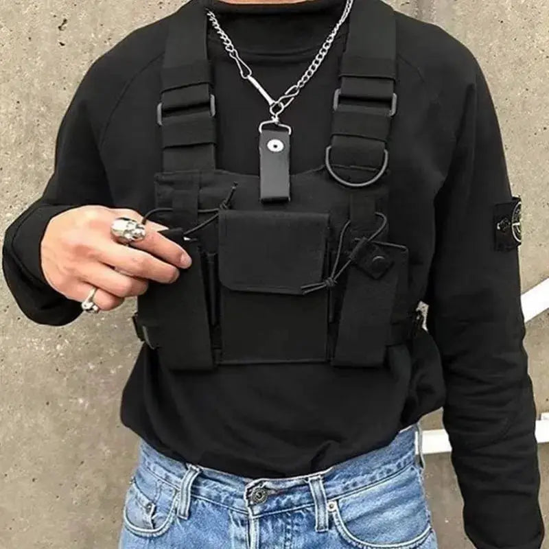 Black tactical chest rig bag with multiple pockets and pouches for streetwear