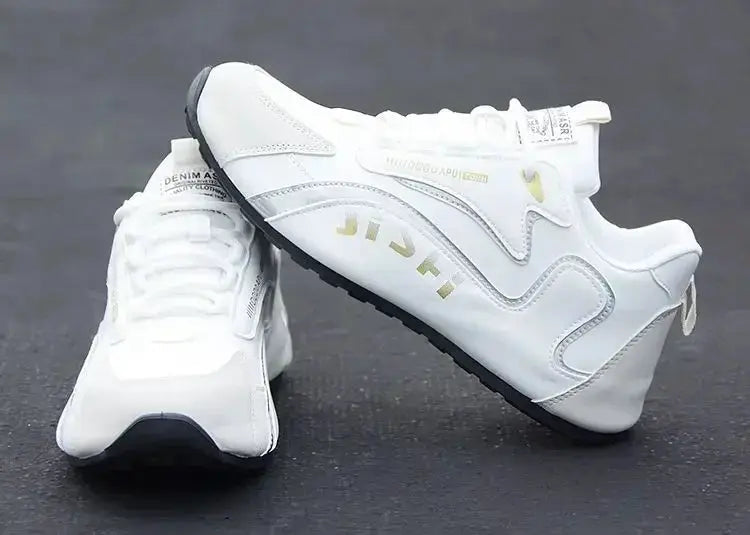 Pair of men's white PU leather waterproof sneakers by Simples Market with non-slip outsole