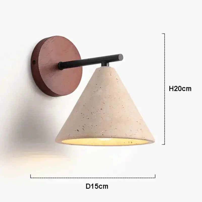 Natural stone wall lamp by Simples Market with travertine cone shade, beige finish, black arm, round wood backplate