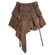 Short brown pleated skirt with irregular layered panels and adjustable leather straps
