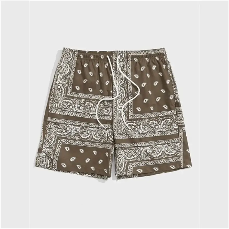 Trend Bandana Graphic Beach Shorts for men in brown with white paisley print; drawstring waist, casual swim trunks