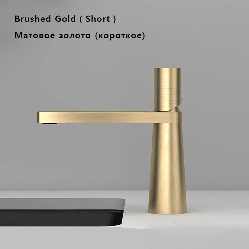 Basin faucet by Simples Market in brushed gold with single-handle mixer for grey washbasin.