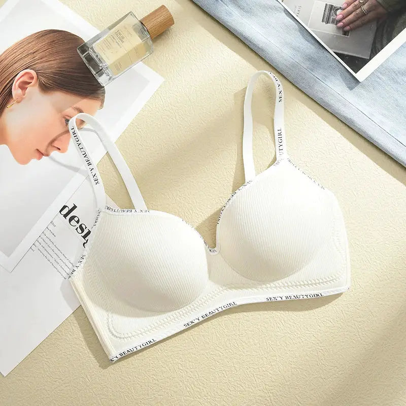 FINETOO white seamless push-up bra with adjustable straps and SEXY BEAUTYGIRL branded band