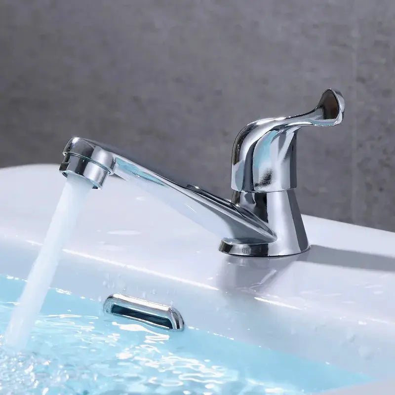 Bathroom basin faucet, chrome single cold-water mixer with curved lever handle.