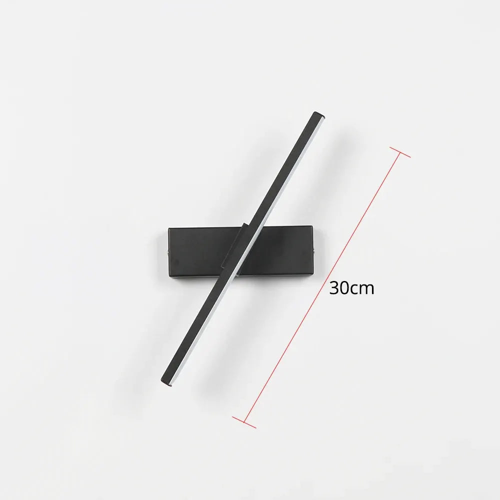 Bedroom bedside wall light by Simples Market, black aluminum LED wall lamp with 30cm diagonal rotatable bar.