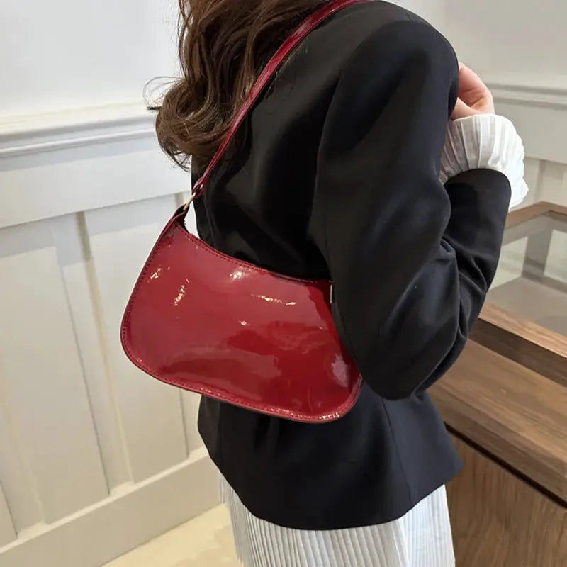 Retro red PU leather shoulder bag by Simples Market; glossy patent finish, hobo-style handbag