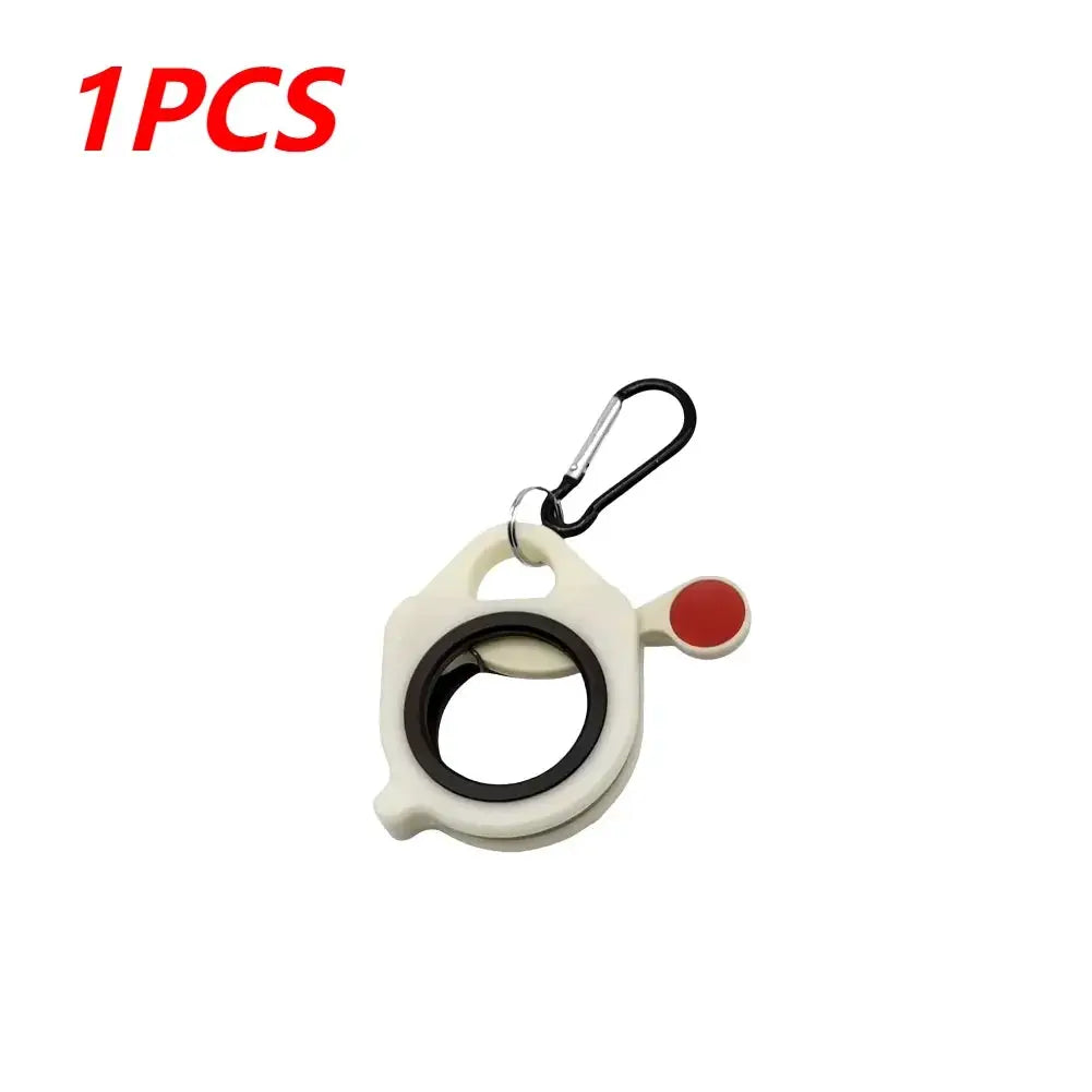 Simples Market cable tie organizer, white plastic housing with black inner ring, red side knob and carabiner clip