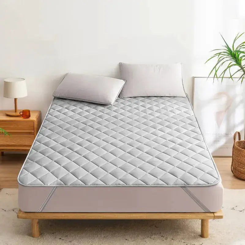 Ultrasonic mattress protector pad by Simples Market, grey quilted, washable with elastic band.