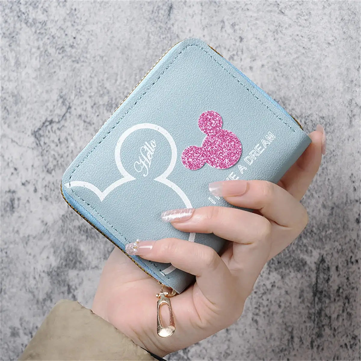 Wallet with zipper in blue cartoon style with pink glitter mouse-head graphic; compact female coin purse.