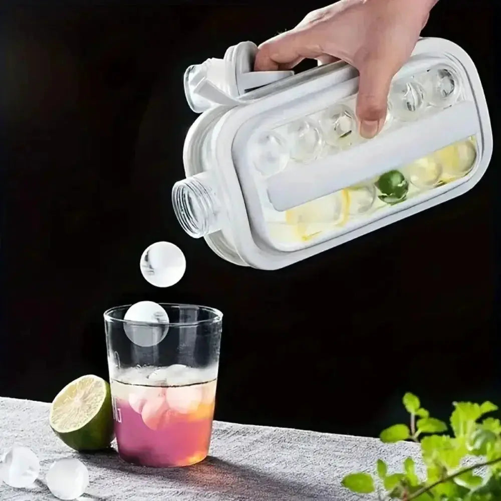 Simples Market portable folding ice maker bottle, white plastic ice cube mold releasing round ice spheres into glass