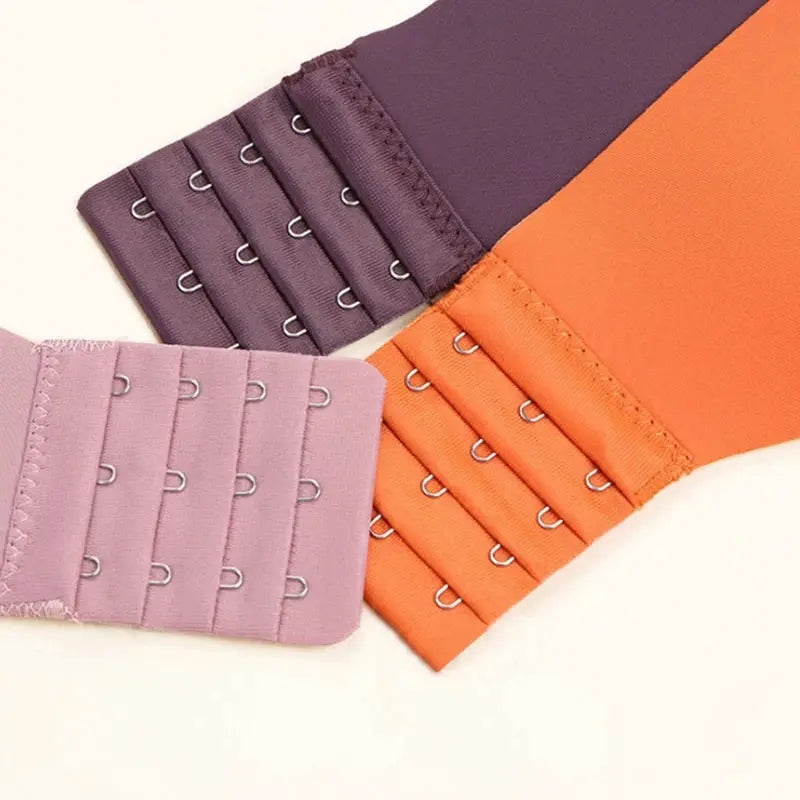 Bra extender set in pink, lilac, purple, and orange with multiple hook rows (4-piece)