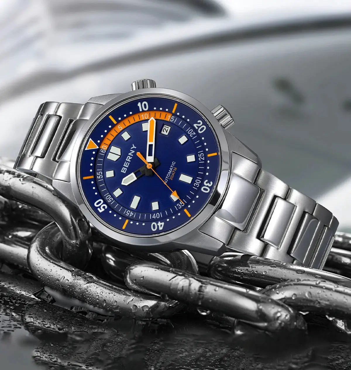 BERNY men's dive watch on stainless steel bracelet with blue dial and orange accents, 200m water resistant.