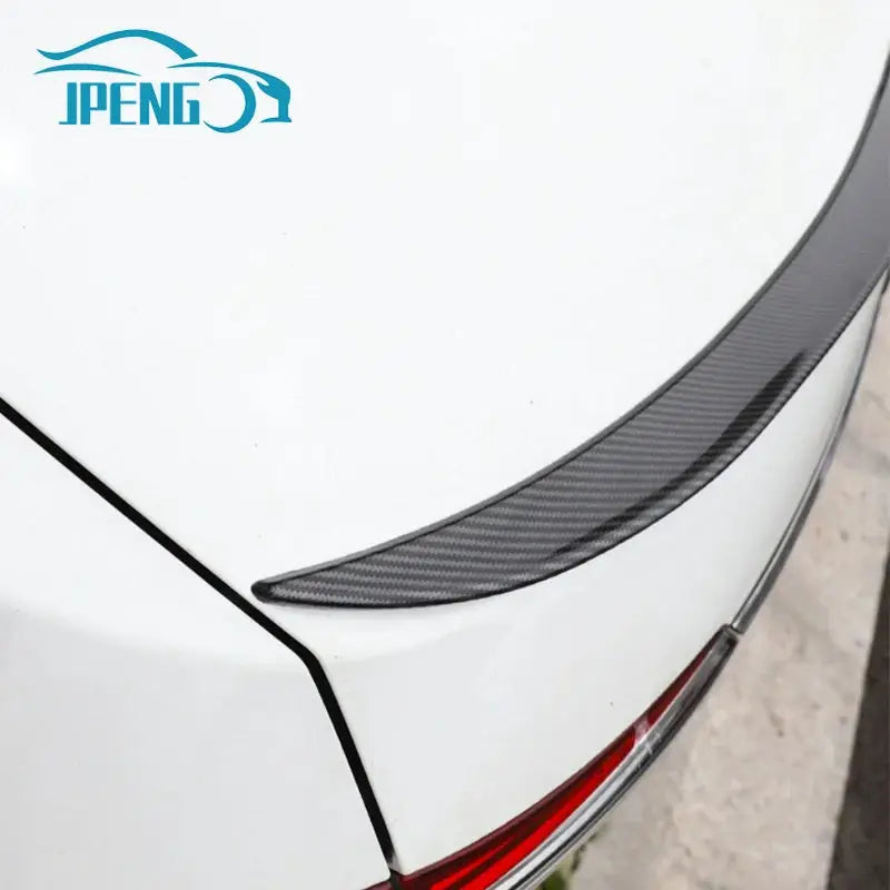 Spoiler lip, carbon fiber finish, 121cm universal sedan rear wing; IPENG logo visible