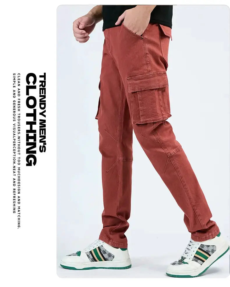 Men's denim cargo pants with elastic waist in rust red, slim fit with multiple pockets