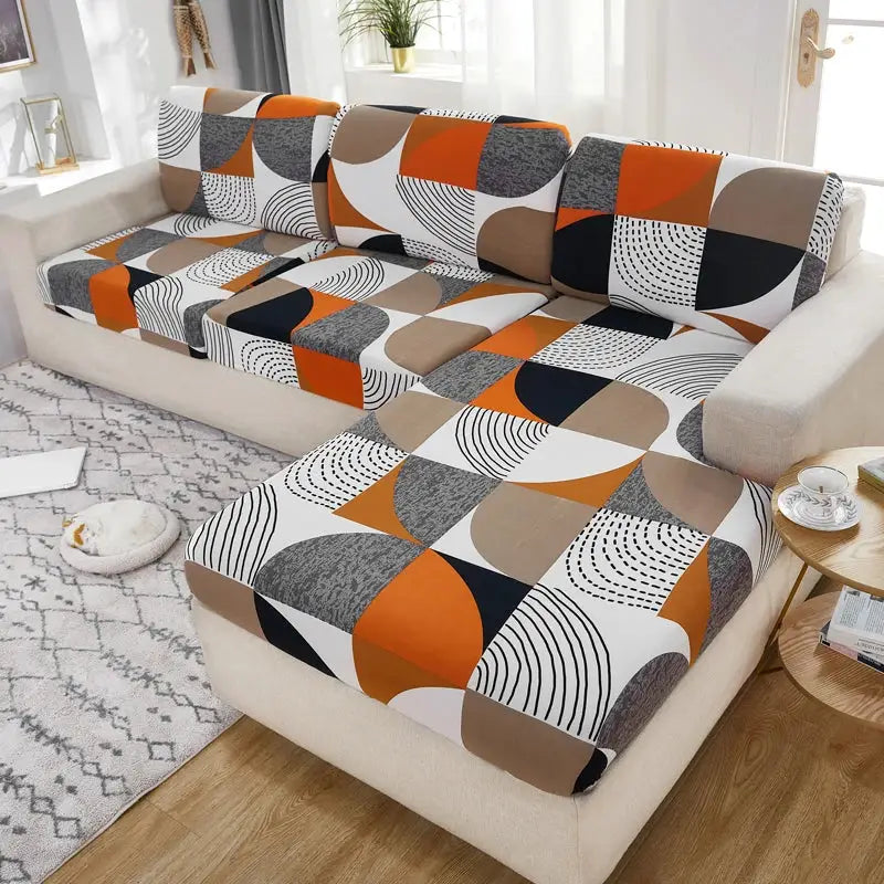 L-shaped sectional sofa slipcover set with orange, taupe, gray patchwork cushions and backrests