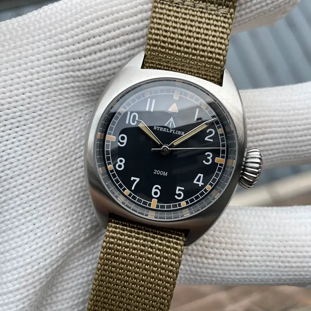 STEELFLIER SF745 wristwatch; unisex 36mm steel case, black dial, khaki strap, luminous hands, 200m water resistant