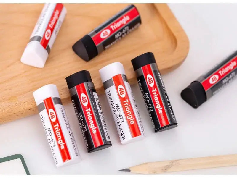 6-piece set of 4B Triangle erasers by Simples Market in white and black with red labels
