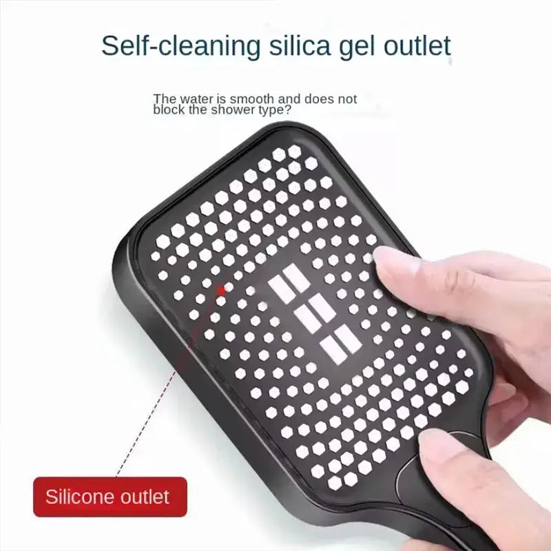 Self-cleaning silica gel outlet; black handheld device with white hexagonal silicone grid.