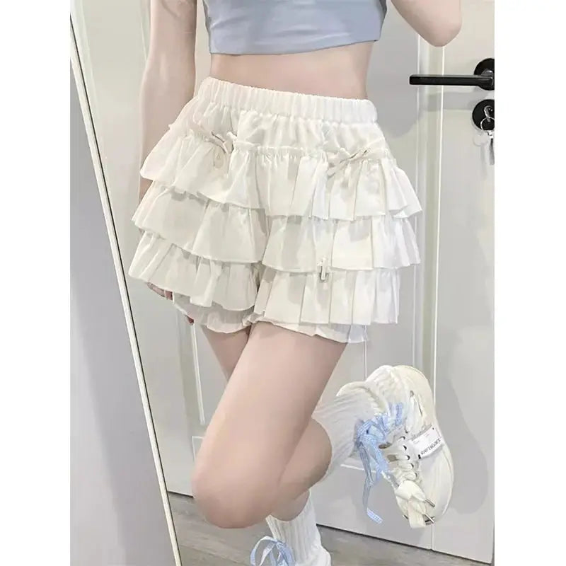 MEXZT Y2K Sweet Ruffles Mini Skirt in white by Simples Market, high-waisted tiered A-line
