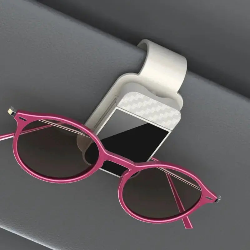 Car sun visor clip with pink round sunglasses attached and integrated card holder