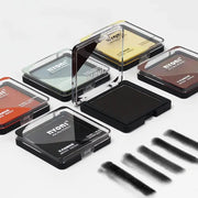 Nyom artist pastel and charcoal drawing set by Simples Market; assorted color pans in clear cases with a black block