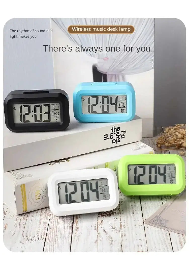 LED digital alarm clock set in black, blue, white and green with backlight and calendar display.