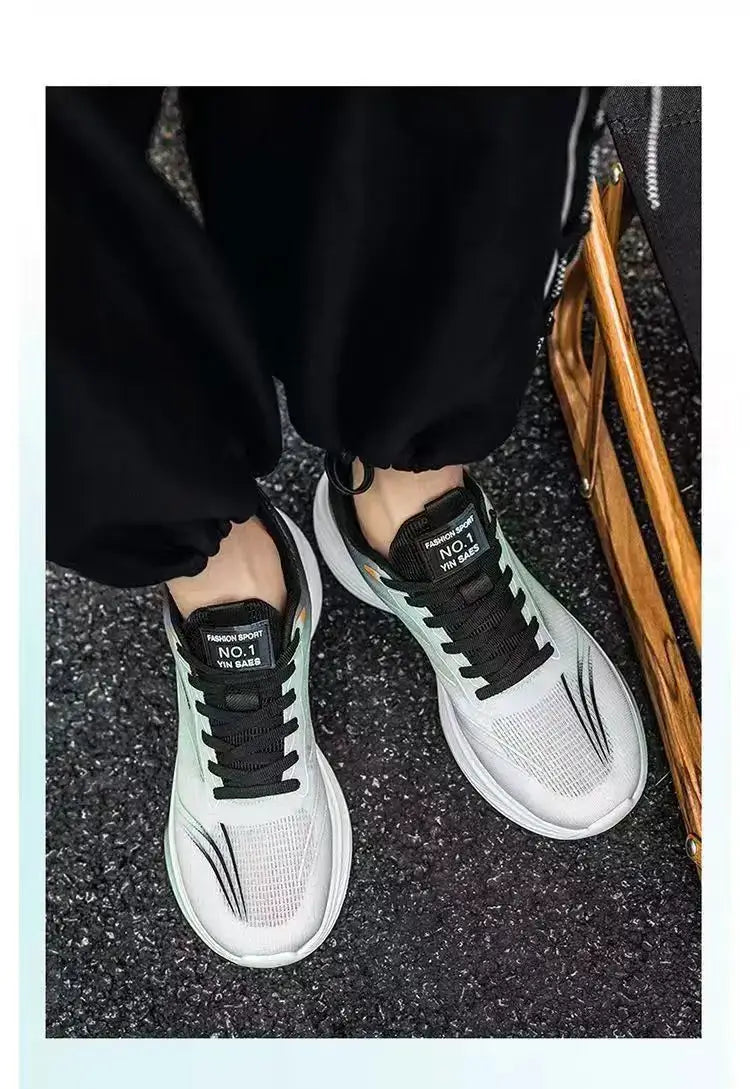Breathable mesh men's sneakers, white-gray with black laces, lightweight casual running shoes.