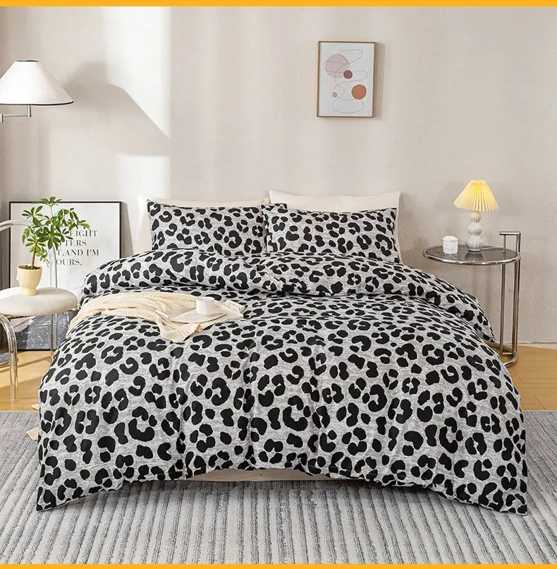 Leopard print duvet cover set, 3pcs (1 duvet cover + 2 pillowcases), black and gray on white.