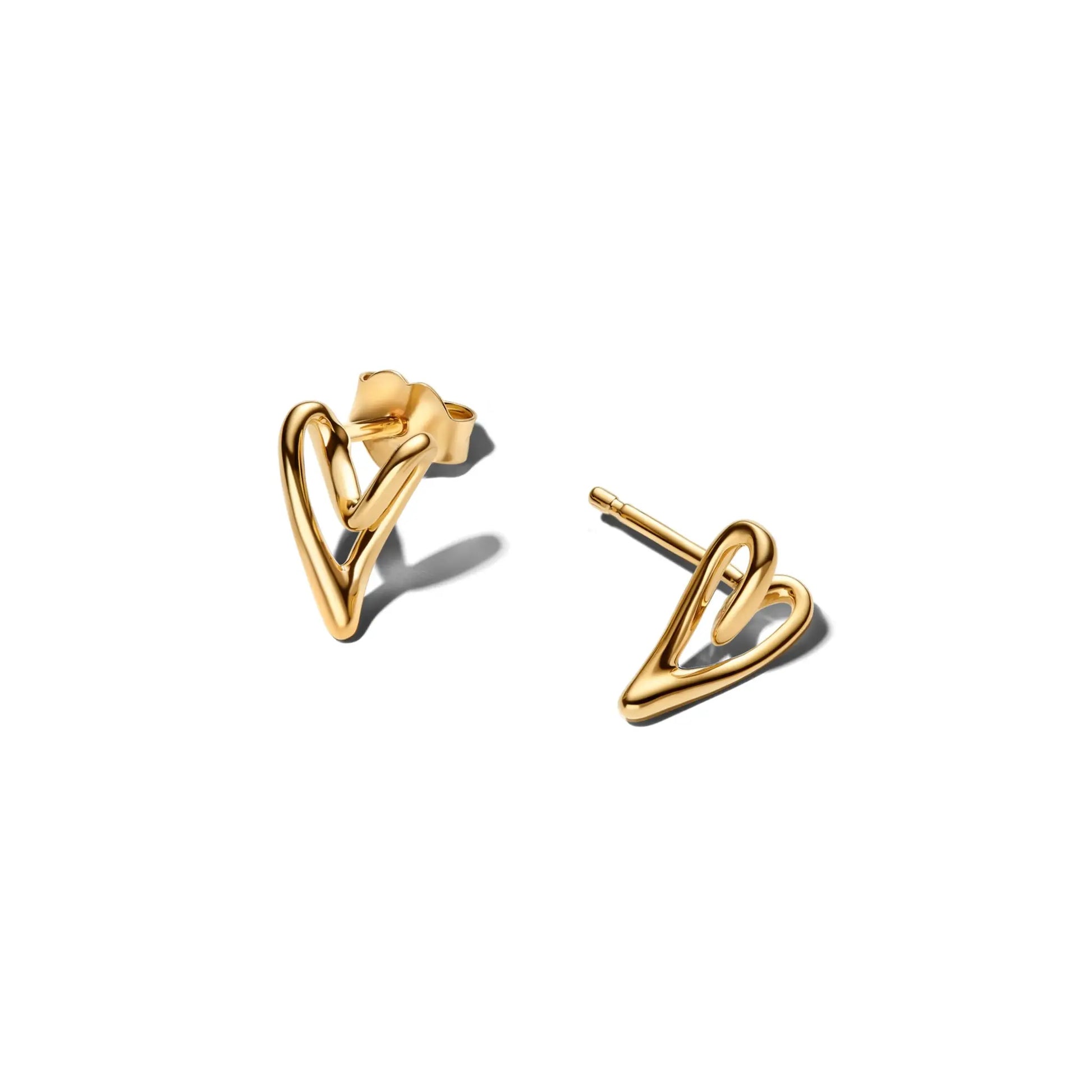 Gold-tone jewelry pieces including a ring and bracelet links from a fine jewelry set